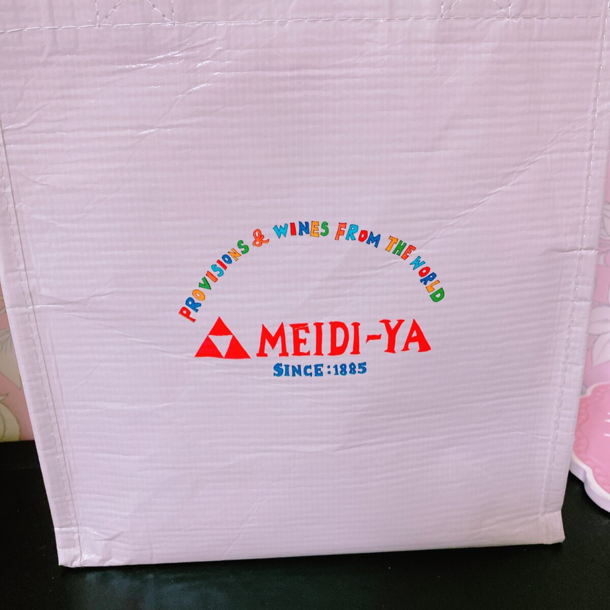 明治屋のロゴが入った袋